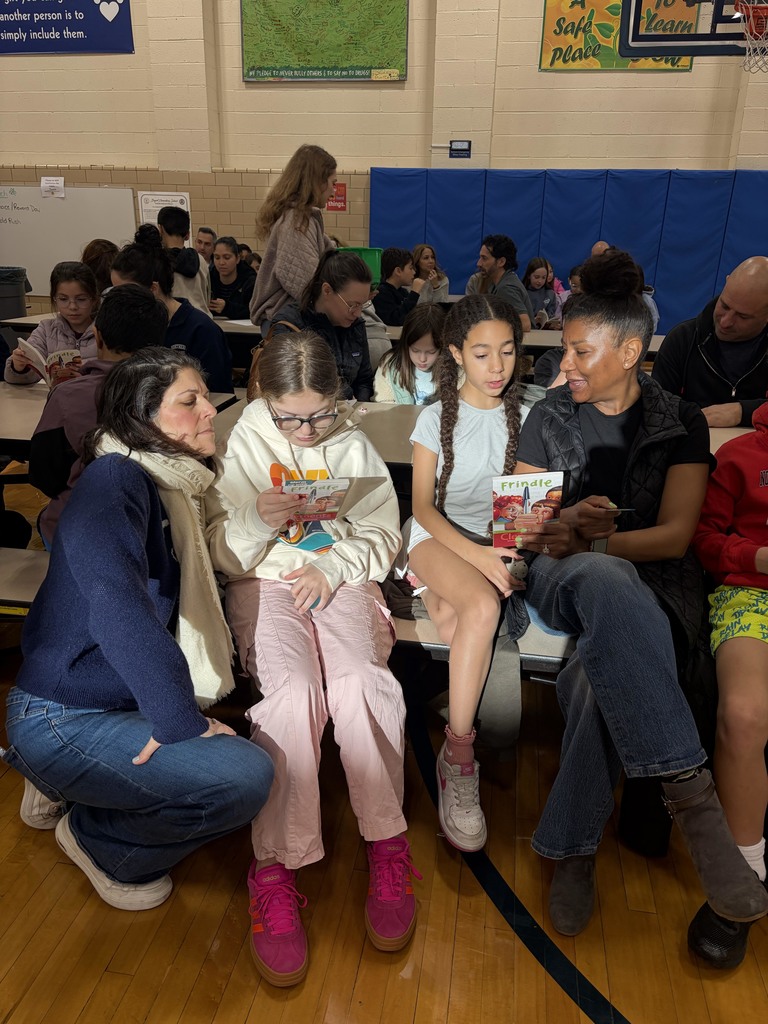 Students and parents enjoying the Read-A-Latte Cafe