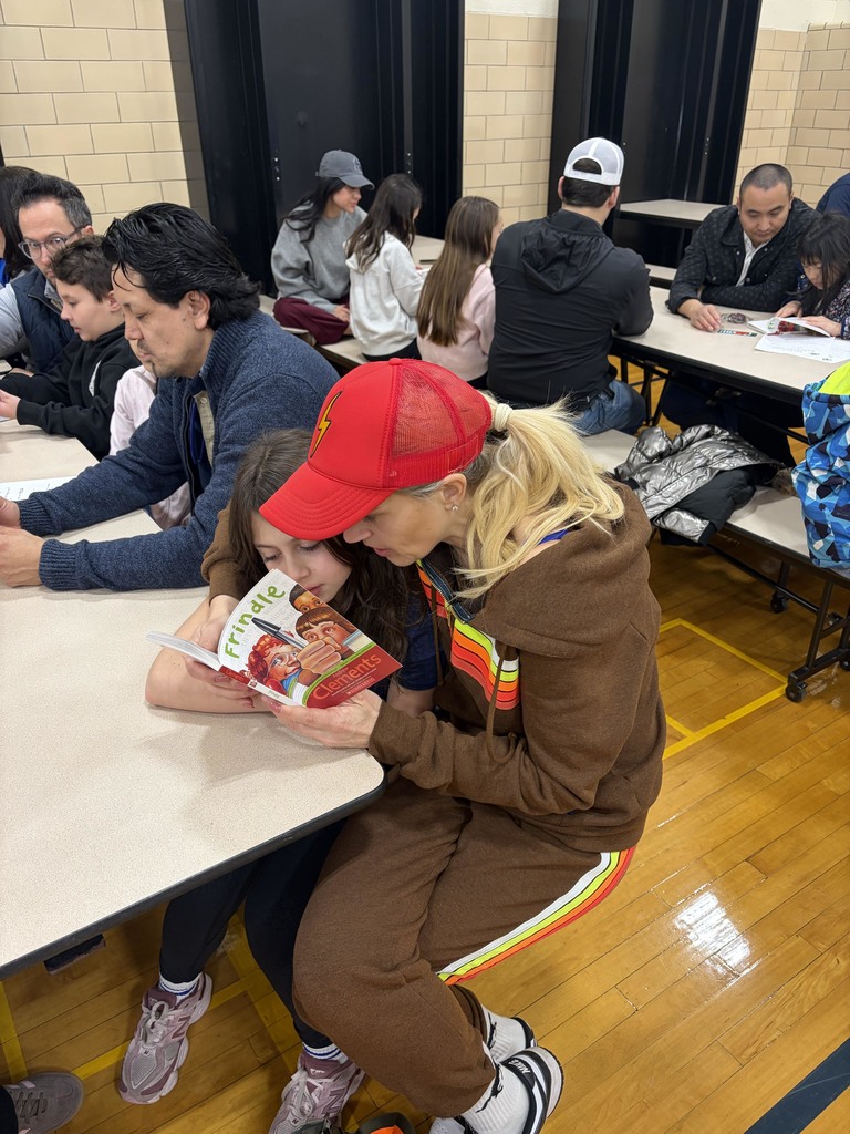 Students and parents enjoying the Read-A-Latte Cafe
