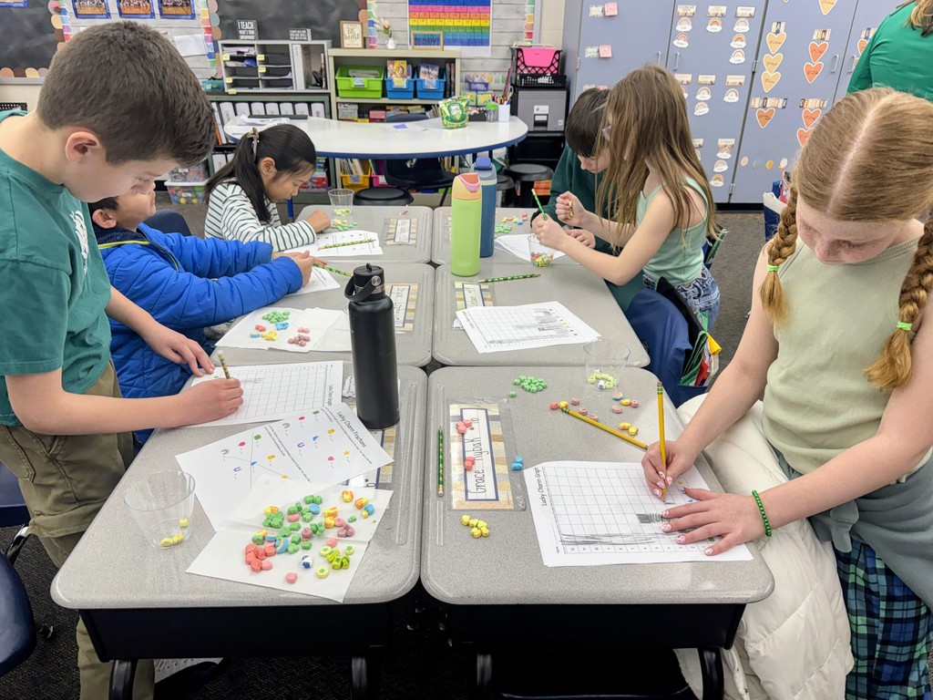 Students from Mrs. Decker's class working on  a St. Patrick's day Math activity!