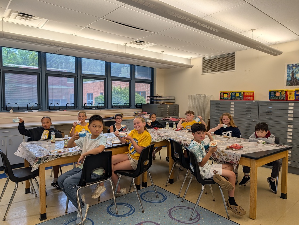5th Grade students participating in their tea party