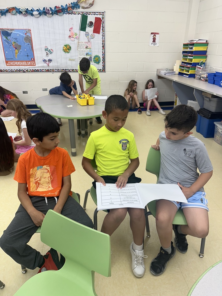 Bogert and Reynolds students sharing work they created in Spanish class