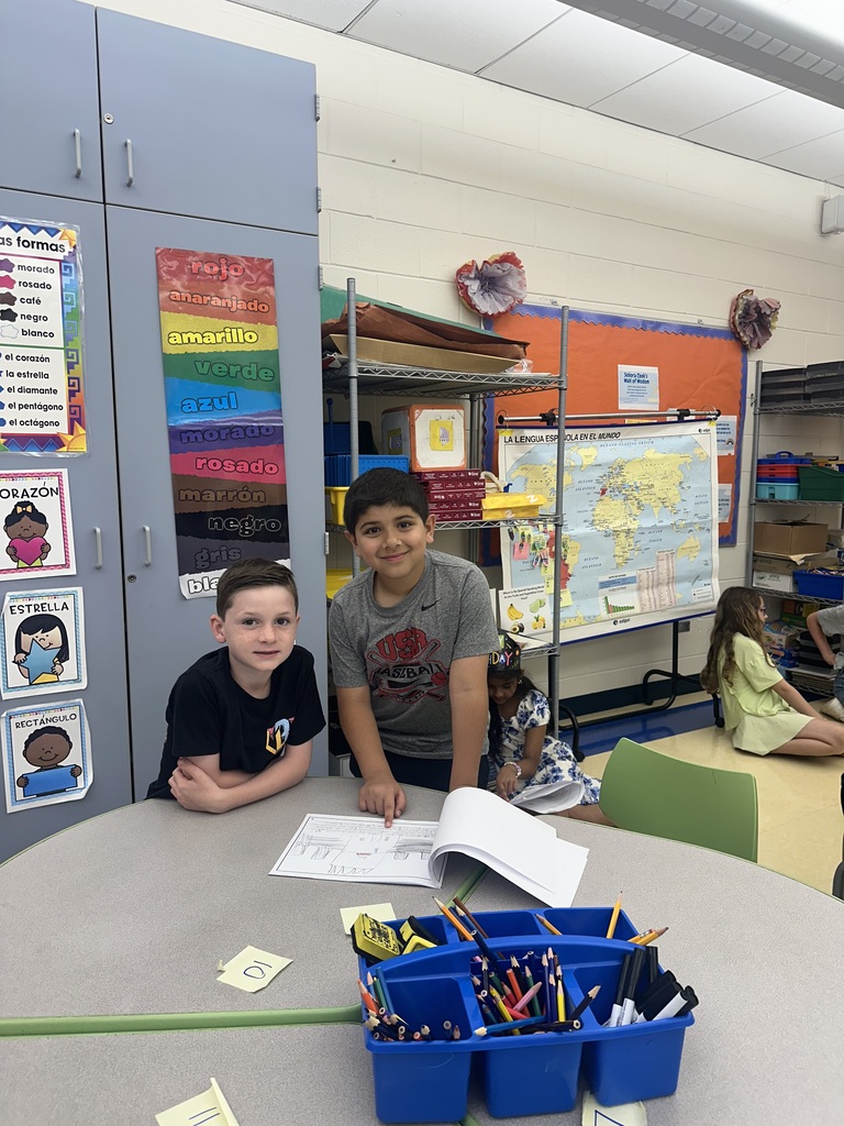 Bogert and Reynolds students sharing work they created in Spanish class