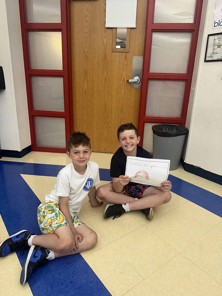 Bogert and Reynolds students sharing work they created in Spanish class