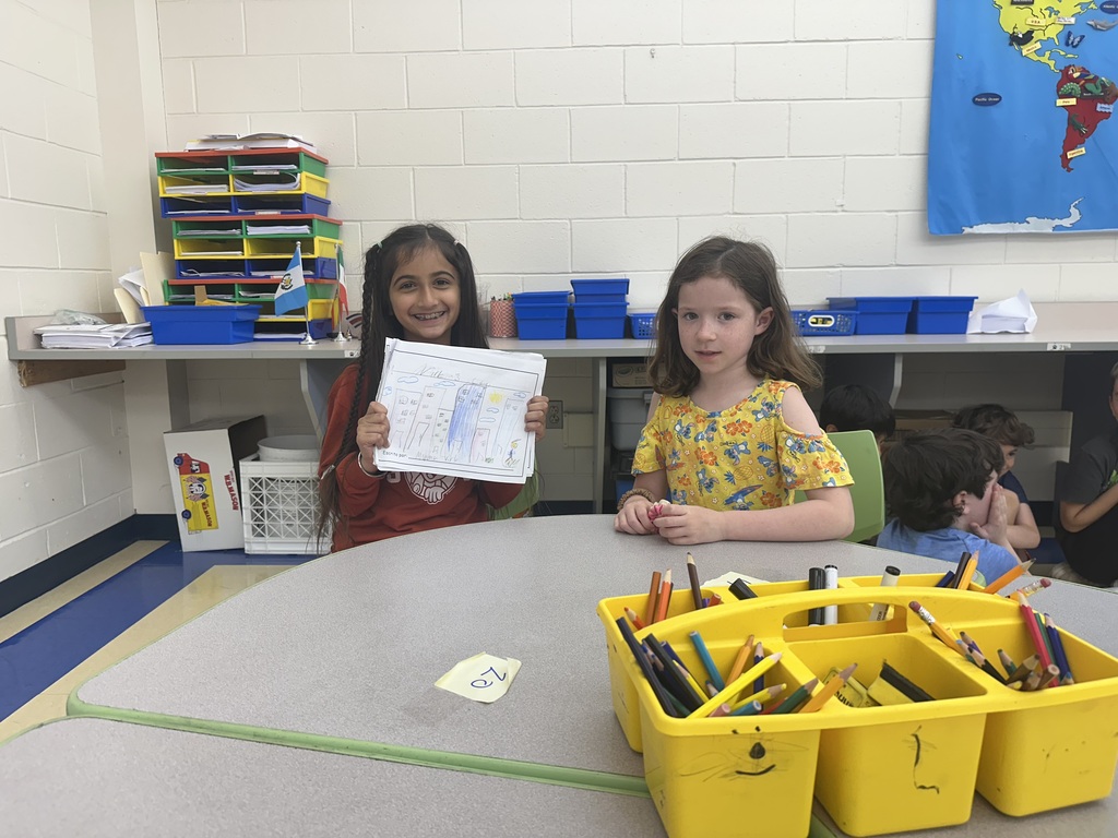 Bogert and Reynolds students sharing work they created in Spanish class