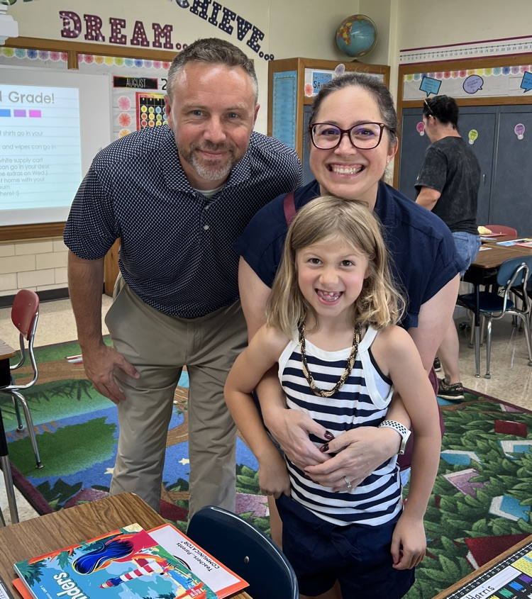 student with parents