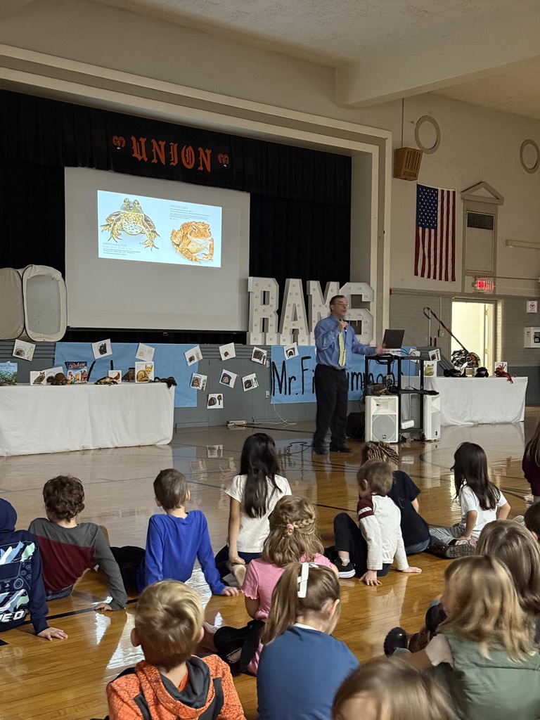 Author speaking to kids
