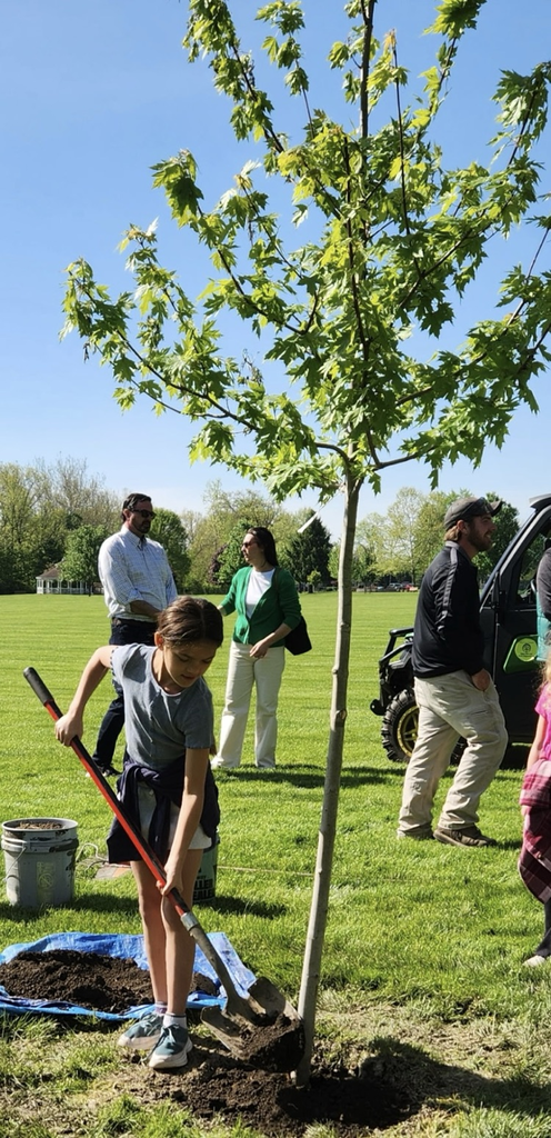 students shoveling 