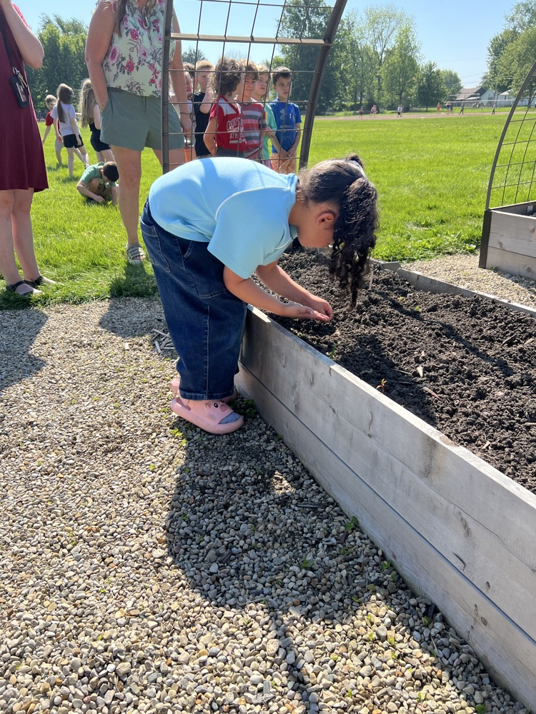 student planting