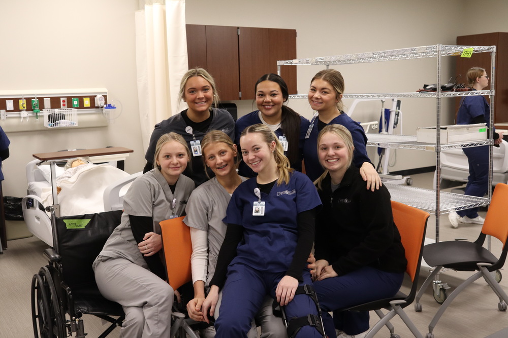 group of nursing students smiling for camera