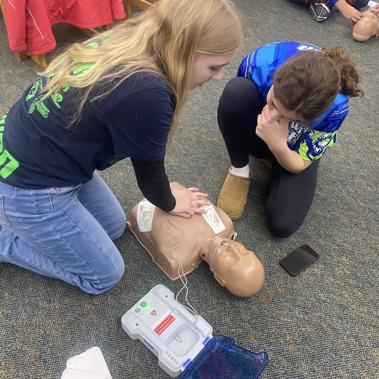 students doing cpr training. 