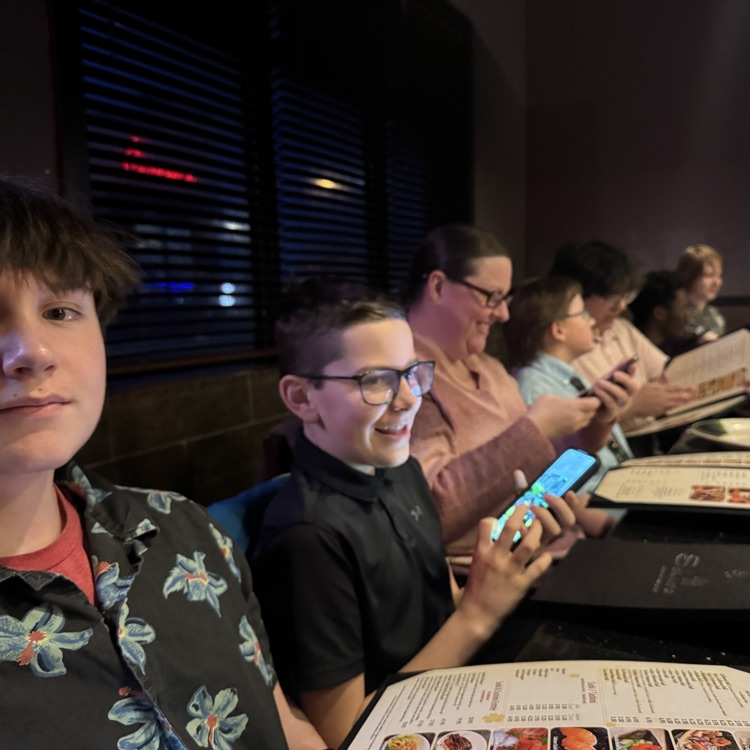 students reading menu