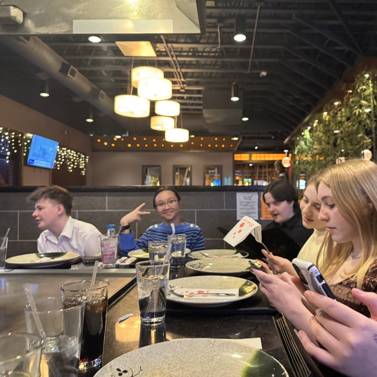 students reading menus