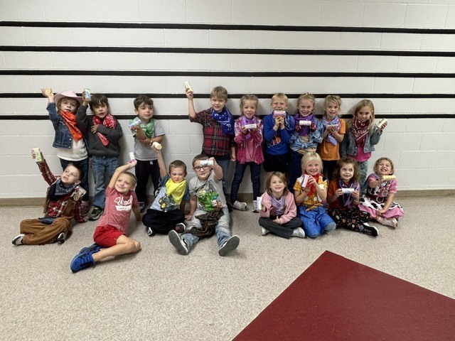 Kindergarten class holding shakers