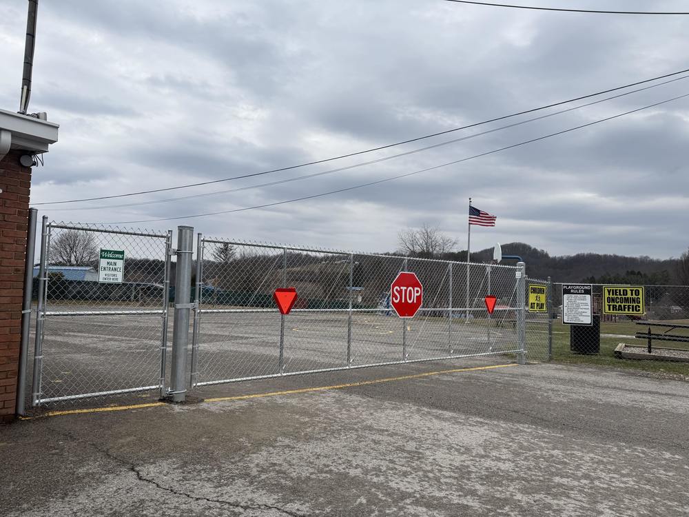 New fencing gate across the road at TES