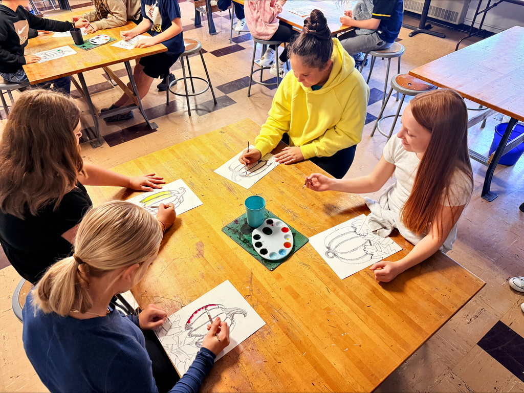 6th grade BUMS students working on pumpkin art
