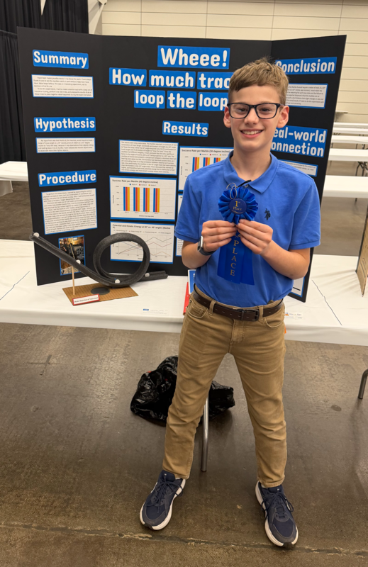 A picture of Ben with his science fair presentation. For a more detailed description place call 304-472-5480.