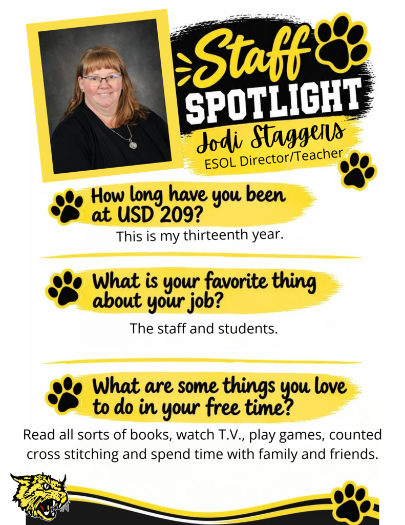 the picture shows a picture of Mrs. Staggers, she is the ESOL director and teacher. She has been with USD 209 for 13 years. Her favorite thing about her job is the staff and the students. she loves to read all sorts of books watch TV, play games, counted cross stitching and spend time with family and friends. 