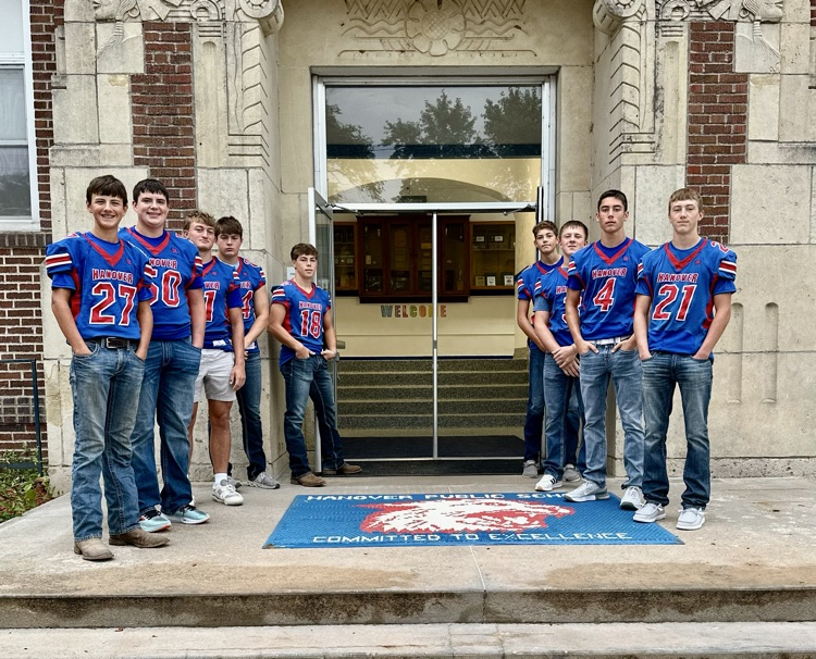 HHS FB Players- greeting every person at the doors of HHS this Friday morning!