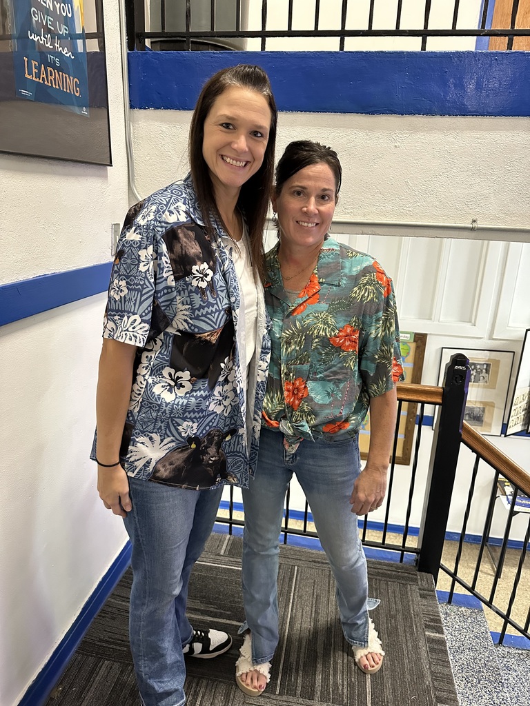 Mrs. Holle and Mrs. Stallbaumer helping the Staff Represent - "Ready for Break at the Beach!"