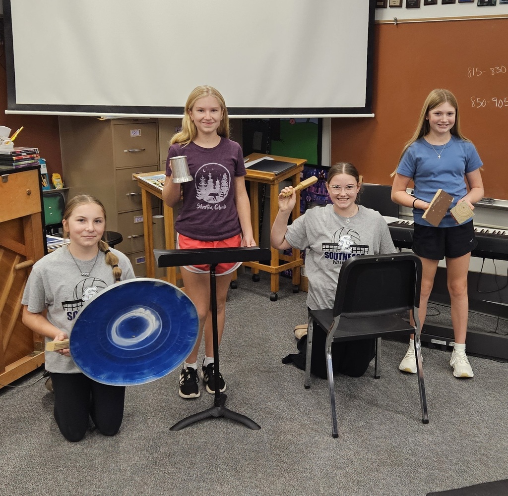 metal trashcan lid and wood block, tin cup and music stand, wood spindle and chair, wood blocks