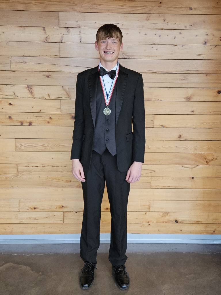 Adam was selected all 4 years and earned his District medal!