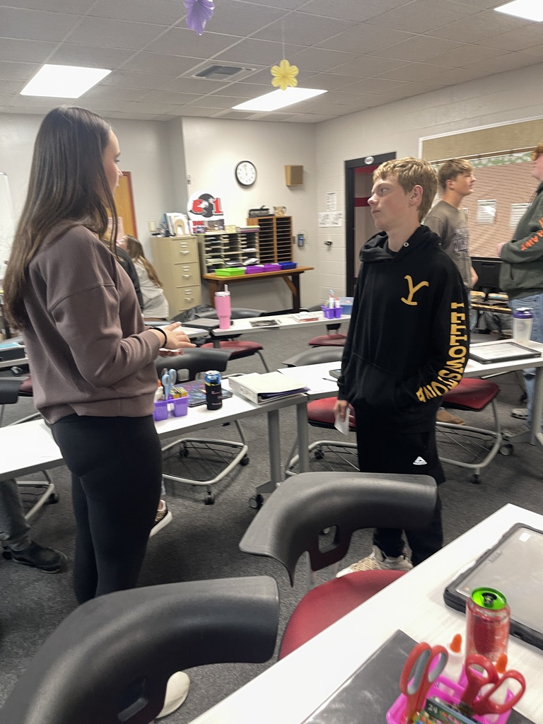 Students sharing information.