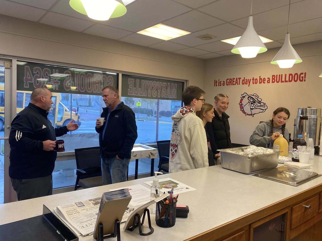 Students and mentors talking together