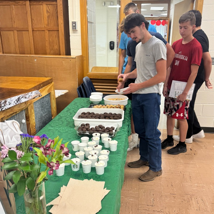 Juniors sampling the muffins and chocolate milk “lattes.”