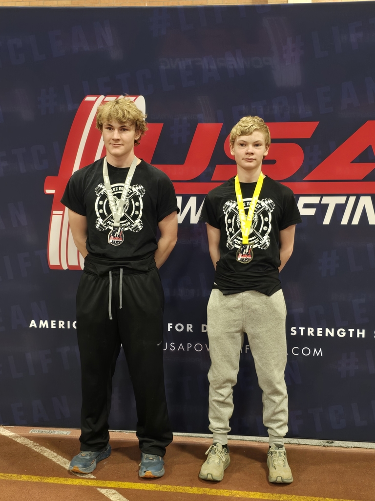 Ben and Sam Klocke with their medals.
