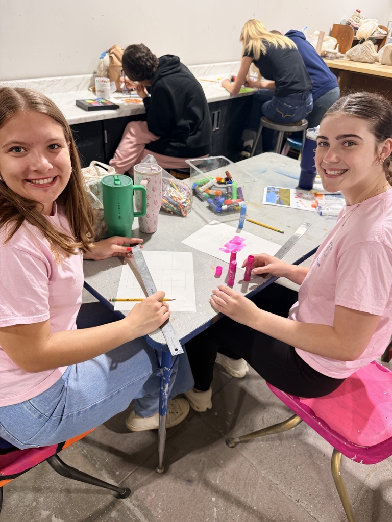 Norah Cassel and Lydia Dumler creating their Minecraft self-portrait