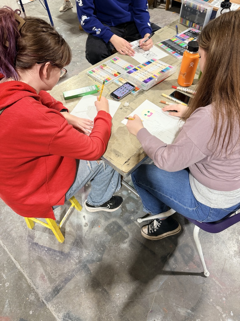 Jaidynn Whearty and Anna Williams creating their Minecraft self-portrait