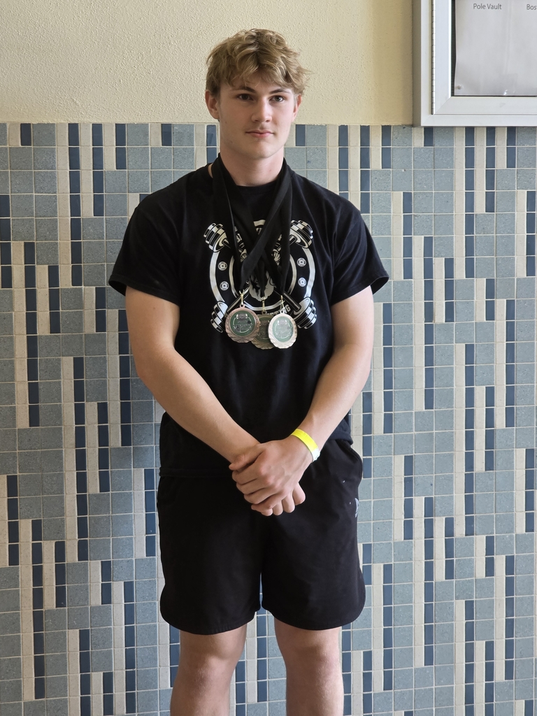 Ben with all three medals.