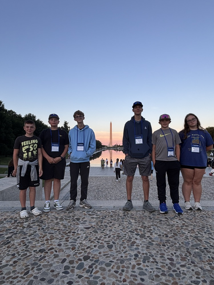Students at reflecting pool