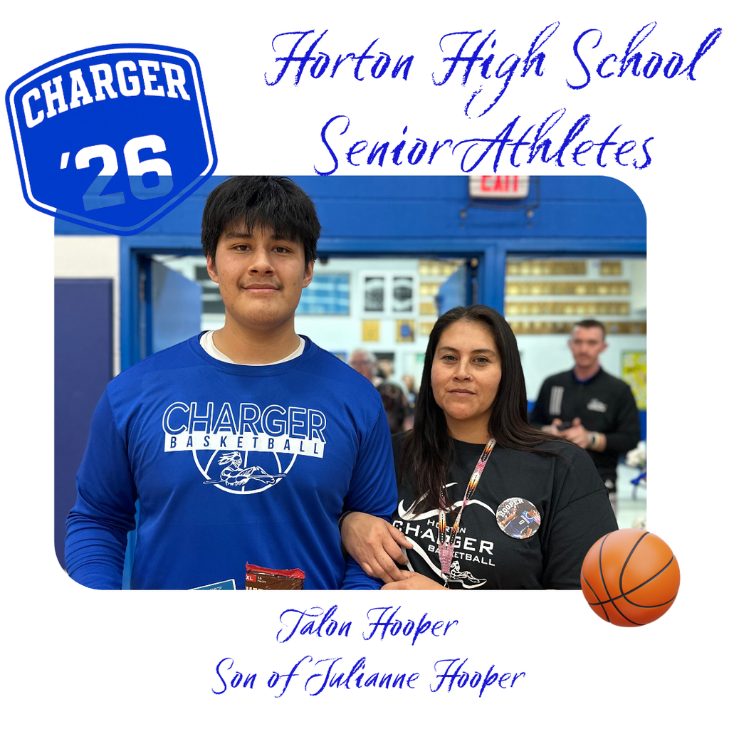 Two individuals stand in a sports setting. One wears a Charger shirt, and the other wears a black shirt.