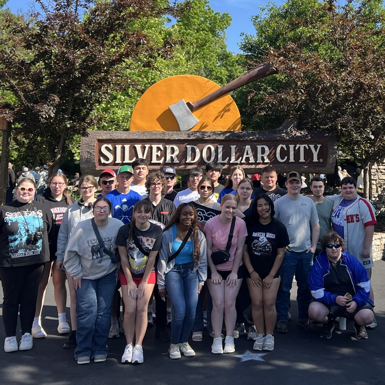students in front of sign at silver dollar city