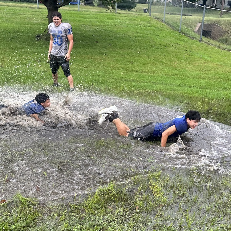 football practice in the rain