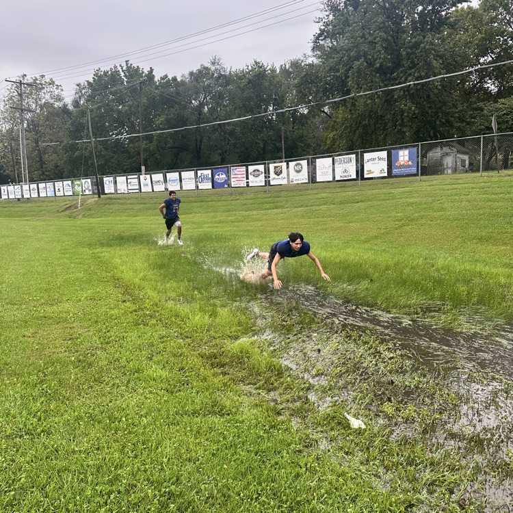 football practice in the rain