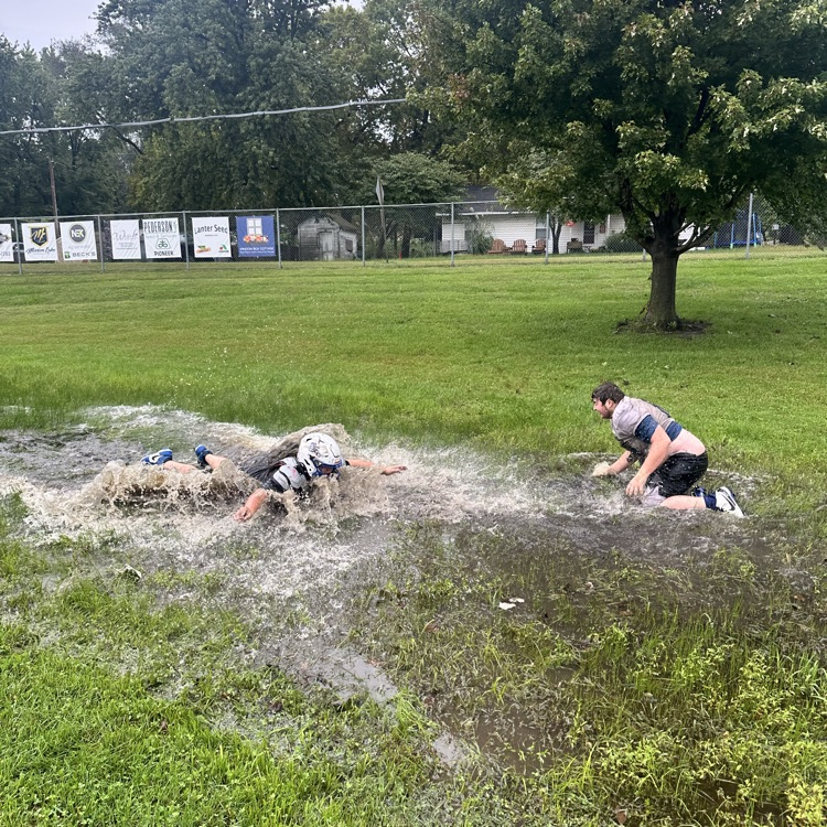 football practice in the rain