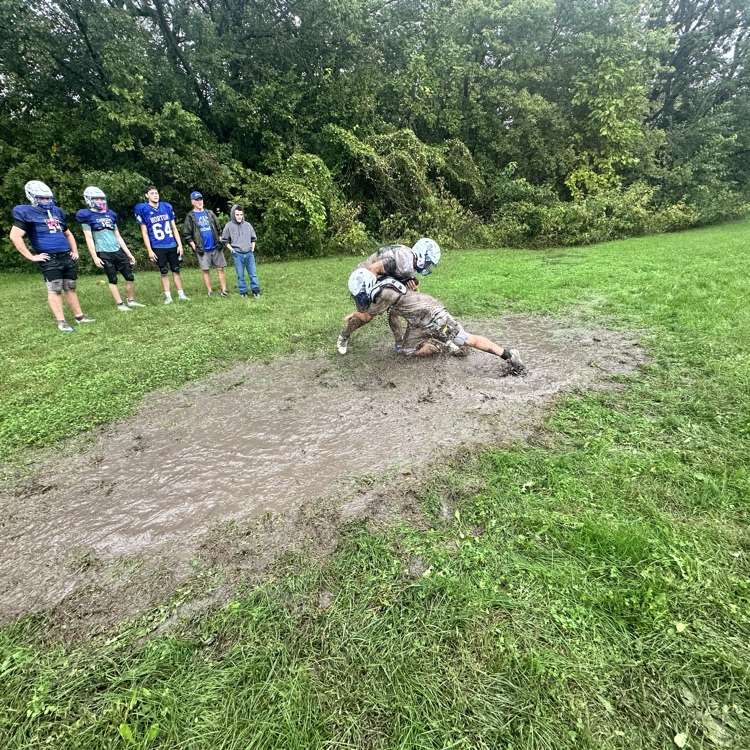 football practice in the rain