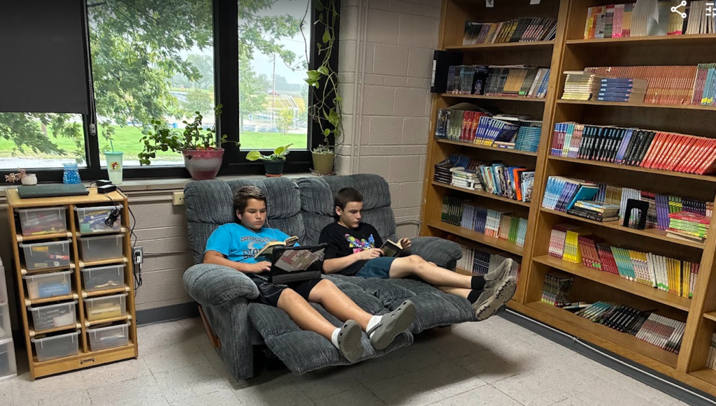 Students reading books.