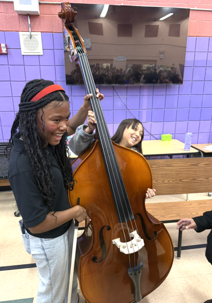 5th graders Exploring Musical Instruments with HS students