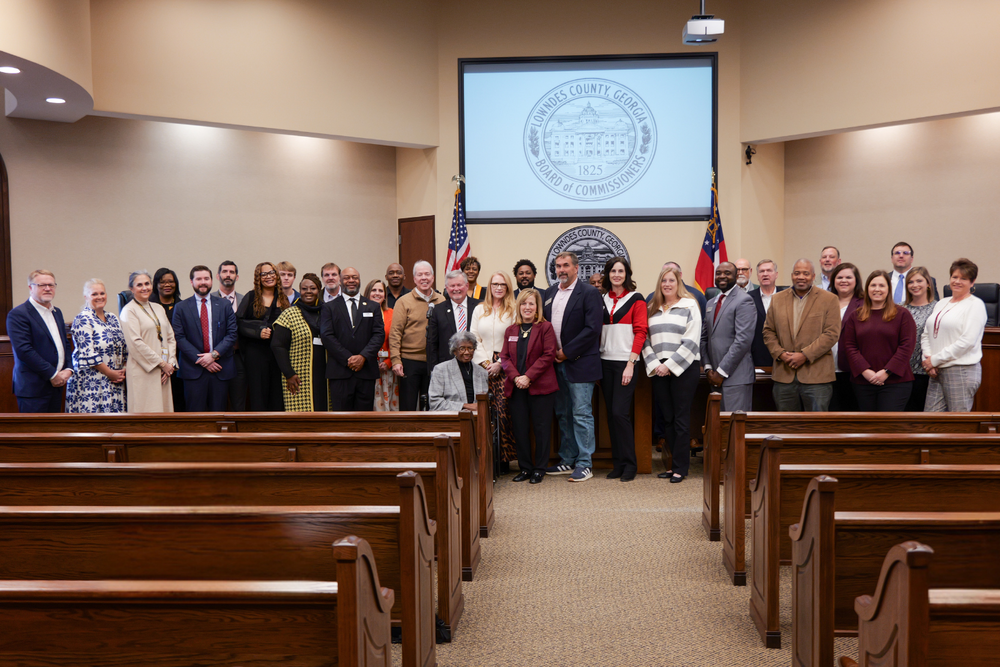 Group photo of VCS reps with LCS reps and City and County officials