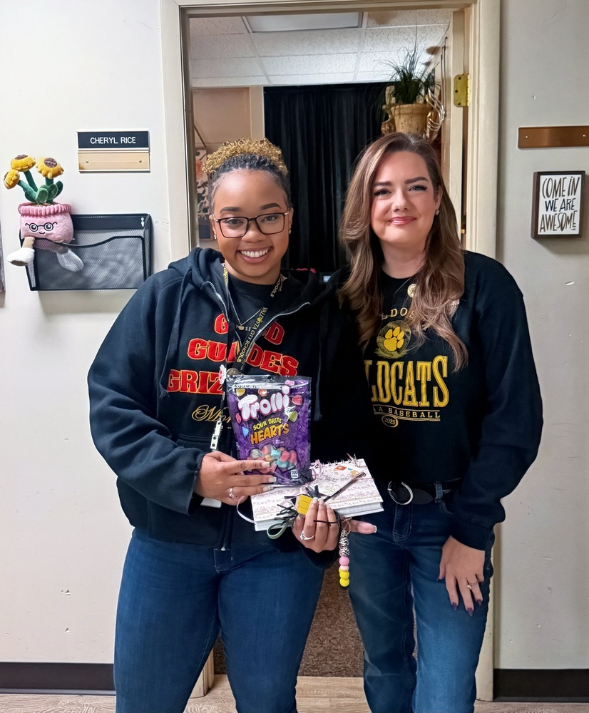 Mrs. Doss with SPED Director, holding gift