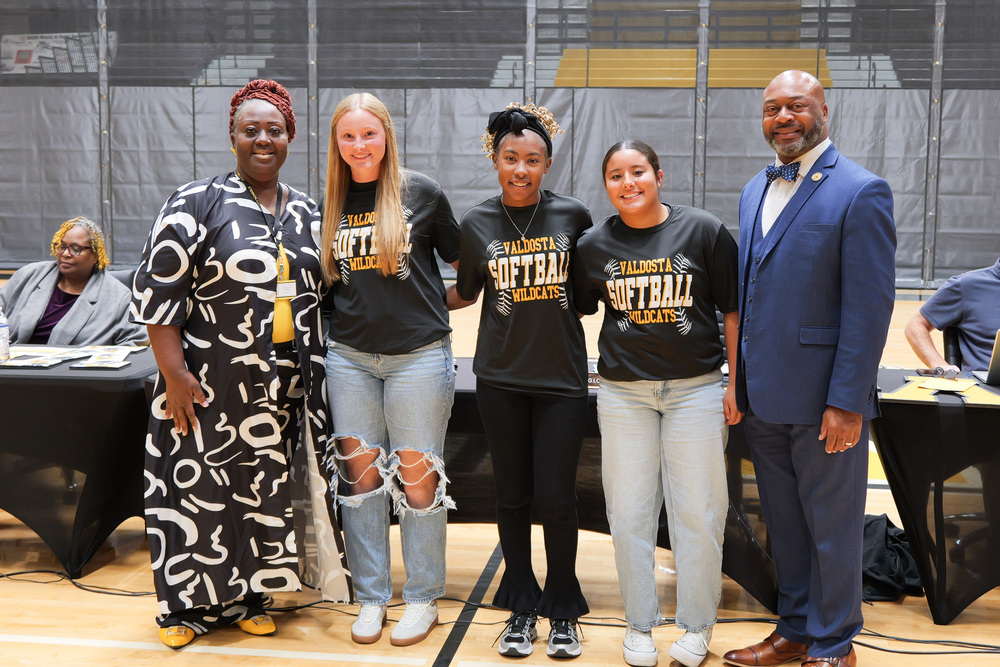 Group photo of students with Dr. Lockhart and Board Chair