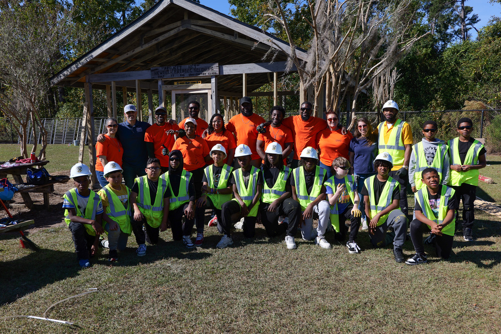 group photo with Lowes and Students