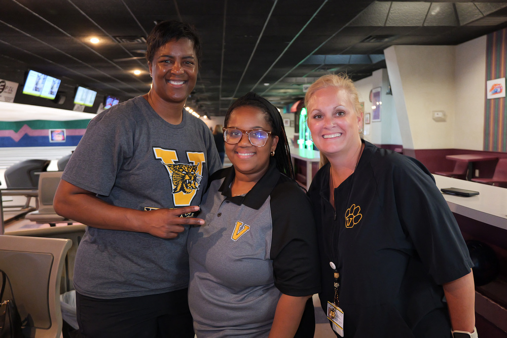 staff participants in bowling alley
