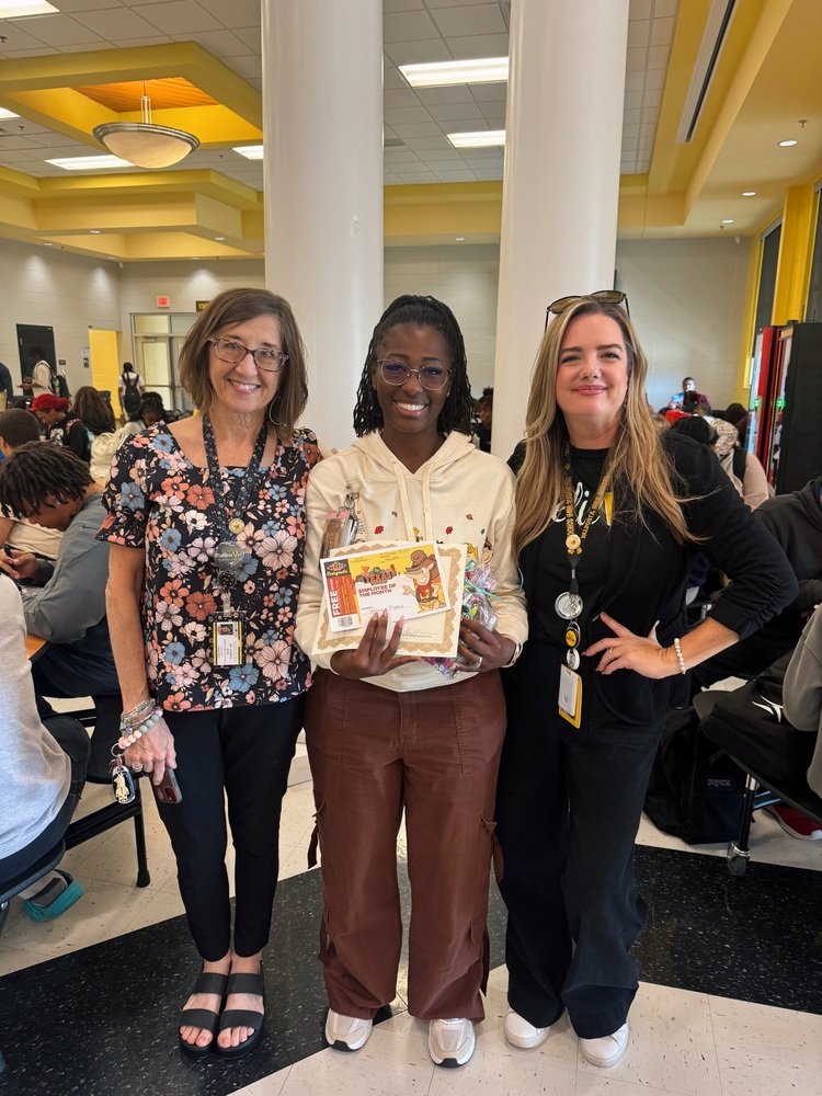 Winner at VHS holding certificate with admin