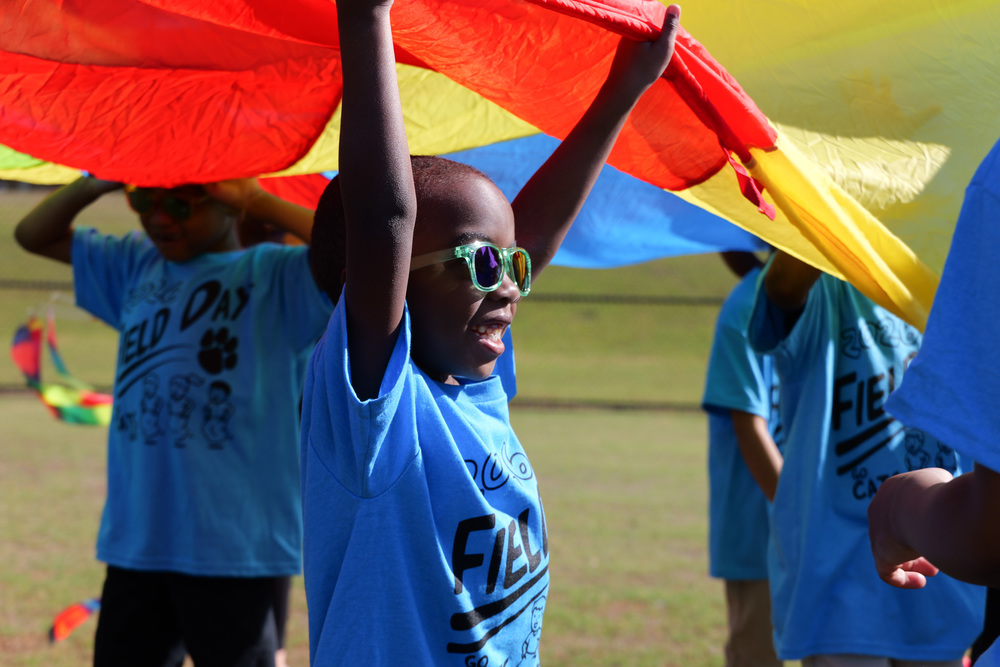Kid playing at one of the stations