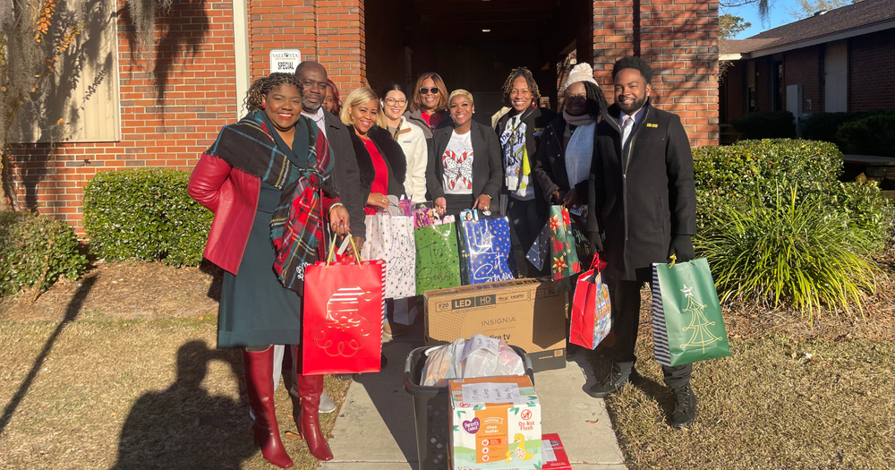 group photo with donations