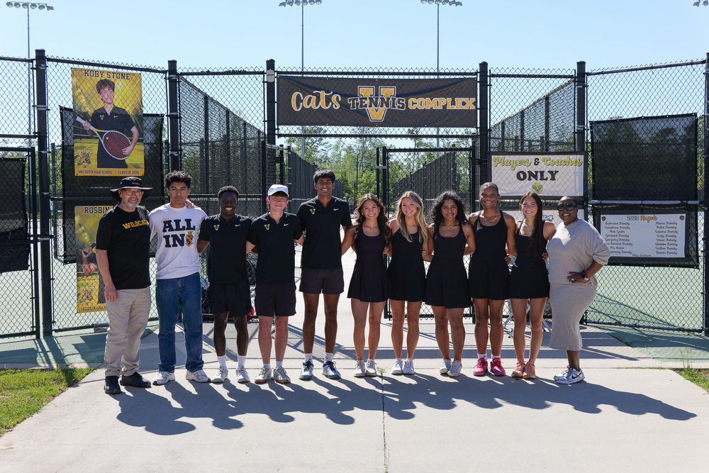 Group photo of seniors with coaches